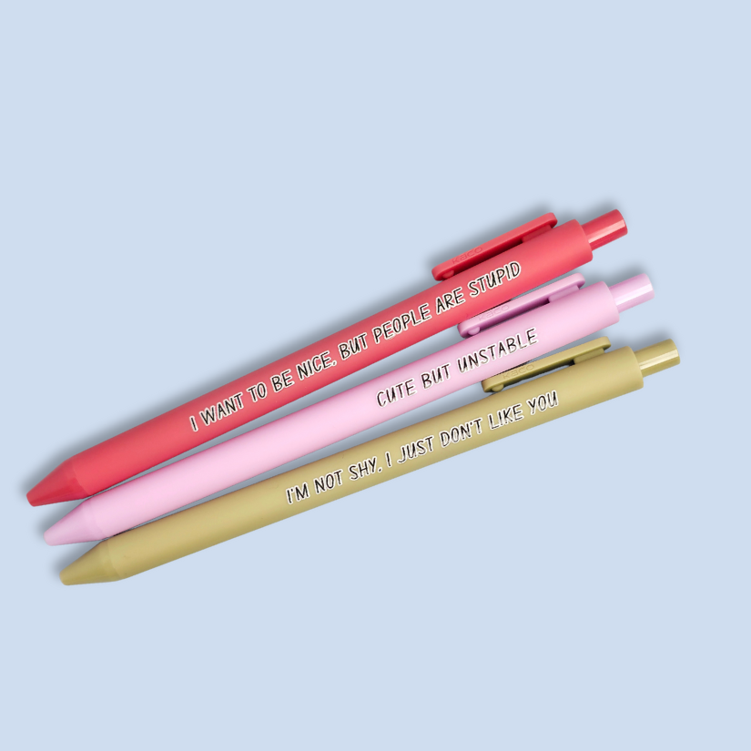 Three pens with sayings on them. "I'm not shy, I just don't like you"(olive green pen), "I want to be nice, but people are stupid" (salmon Pink pen), "Cute but unstable" ( lilac pen).