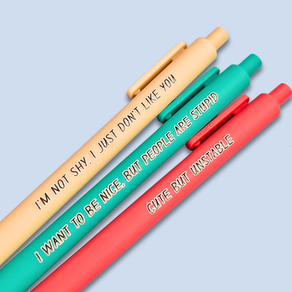 Three pens with sayings on them. "I'm not shy, I just don't like you"(linen pen), "I want to be nice, but people are stupid" (teal pen), "Cute but unstable" ( salmon pink pen).