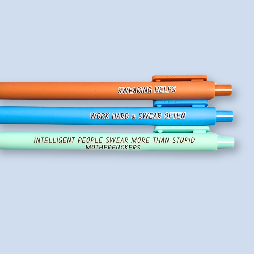Three pens with sayings on them. "Swearing Helps"(Caramel  pen), "Work Hard & Swear often" (bright blue pen), "Intelligent people swear more than stupid motherfuckers" ( mint pen)