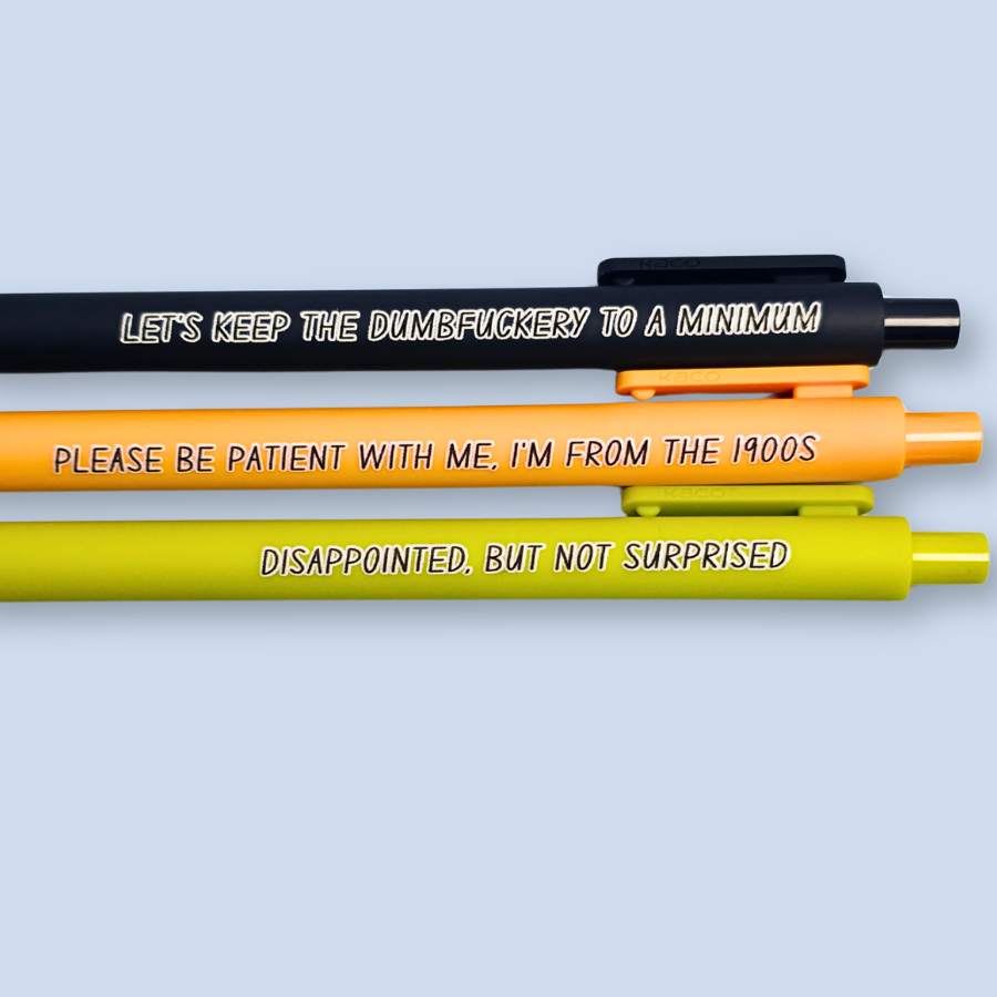 Three pens with humorous text on a light blue background