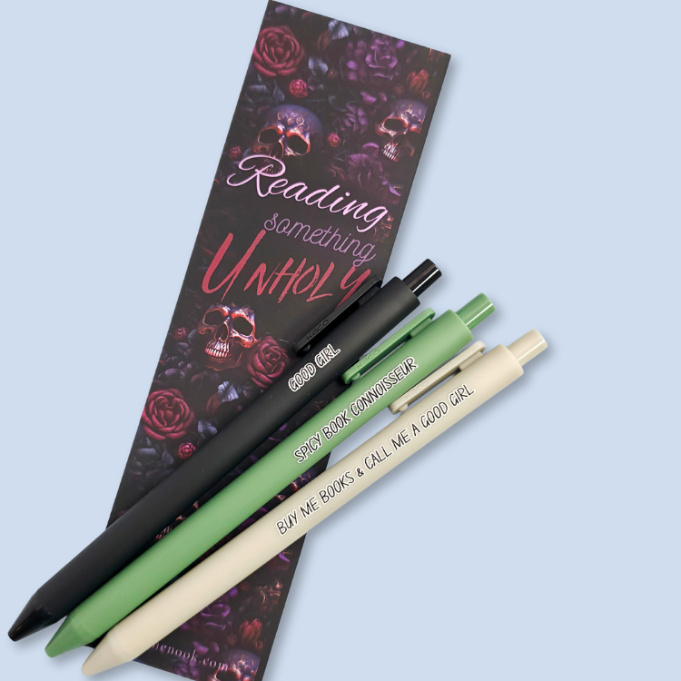 Three pens with quotes. "Good Girl" on a Black pen, "Spicy Book Connoisseur" on a green pen, and "Buy me books and call me a good girl" on a grey pen.