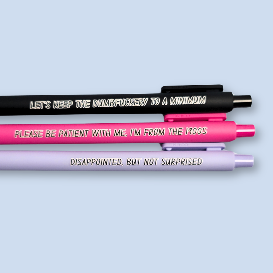 Three pens with humorous text on a light blue background