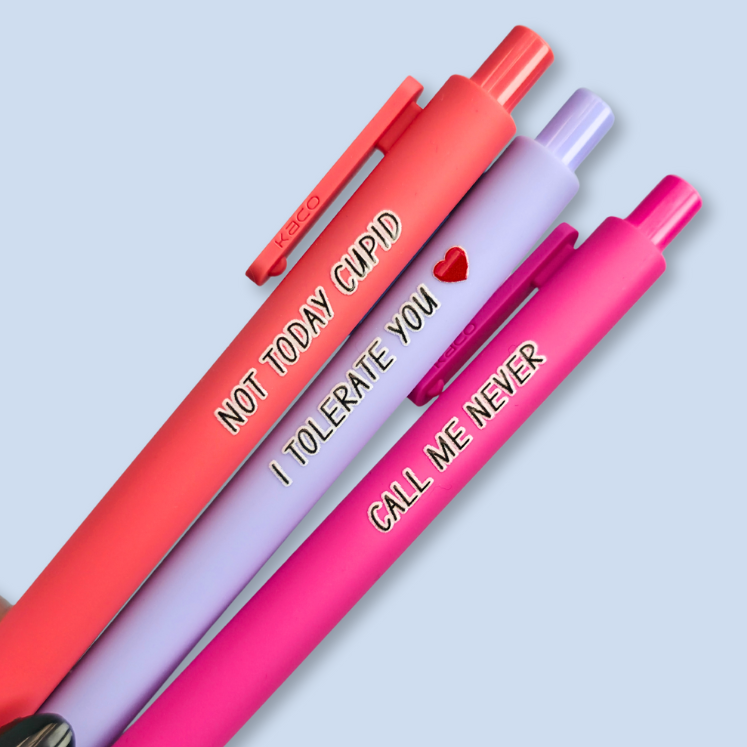 Three pens with text on a light blue background