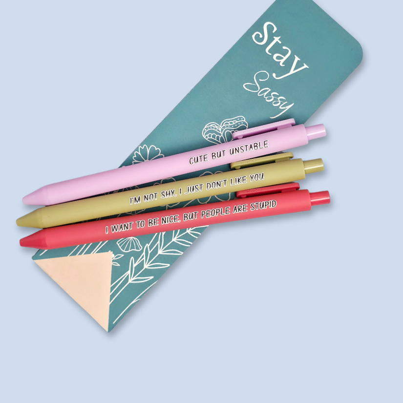 Three pens with sayings on them. "I'm not shy, I just don't like you"(olive green pen), "I want to be nice, but people are stupid" (salmon Pink pen), "Cute but unstable" ( lilac pen).
