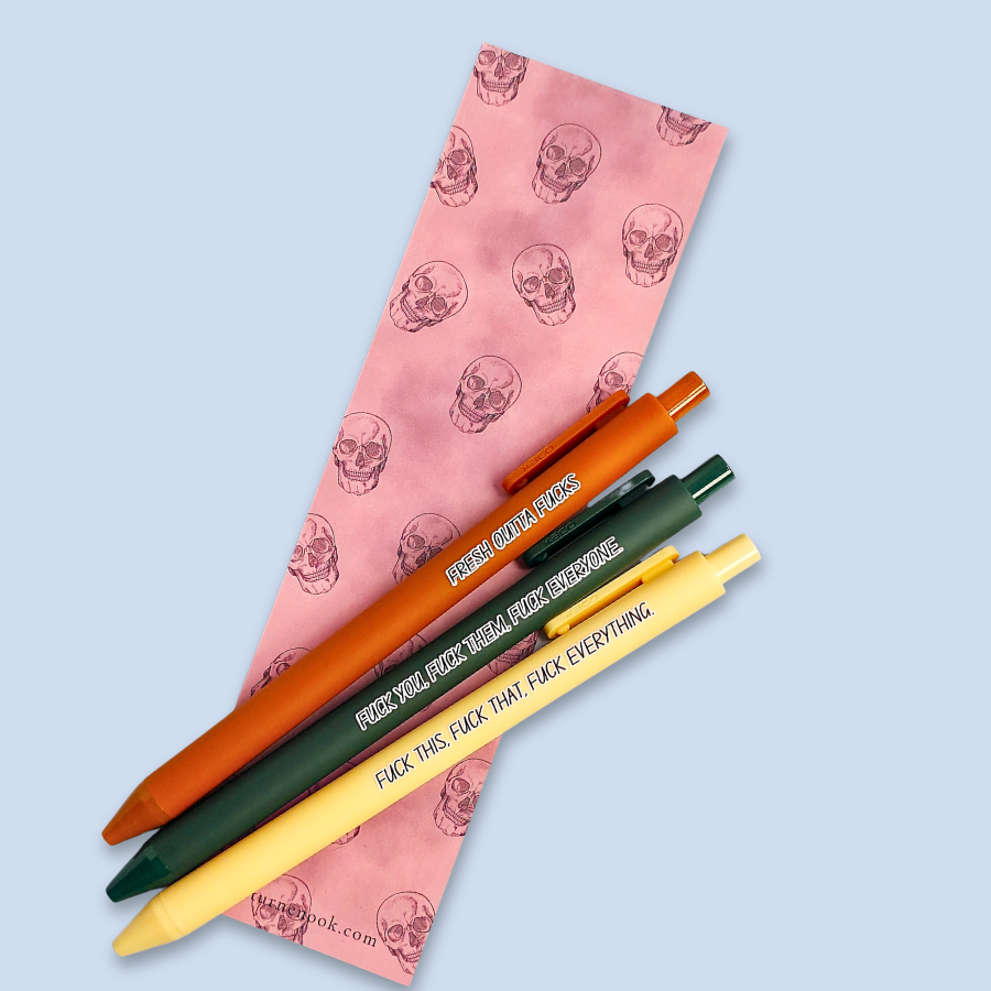 Three pens with sweary text. They read: "Fresh outta fucks" on a siennapurple pen, "Fuck you, fuck them, fuck everyone" on a forest green pen, and " fuck this, fuck that, fuck everything" on a pastel yellow pen