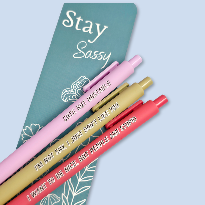 Three pens with sayings on them. "I'm not shy, I just don't like you"(olive green pen), "I want to be nice, but people are stupid" (salmon Pink pen), "Cute but unstable" ( lilac pen).