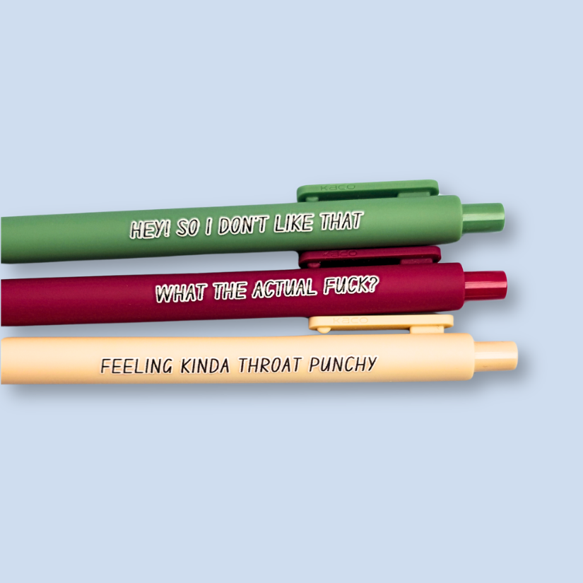 Three pens with sayings on them. "What the actual fuck?."(wine pen), "Hey! So I don't like that" (moss green pen), "Feeling kinda throat punchy" ( linen pen).