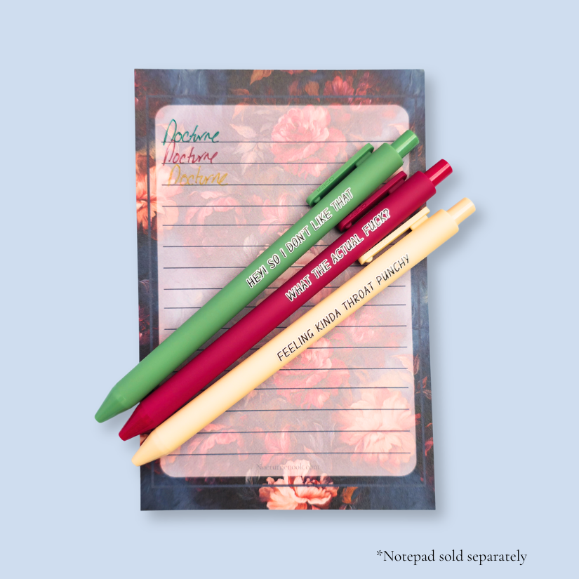 Three pens with sayings on them. "What the actual fuck?."(wine pen), "Hey! So I don't like that" (moss green pen), "Feeling kinda throat punchy" ( linen pen).