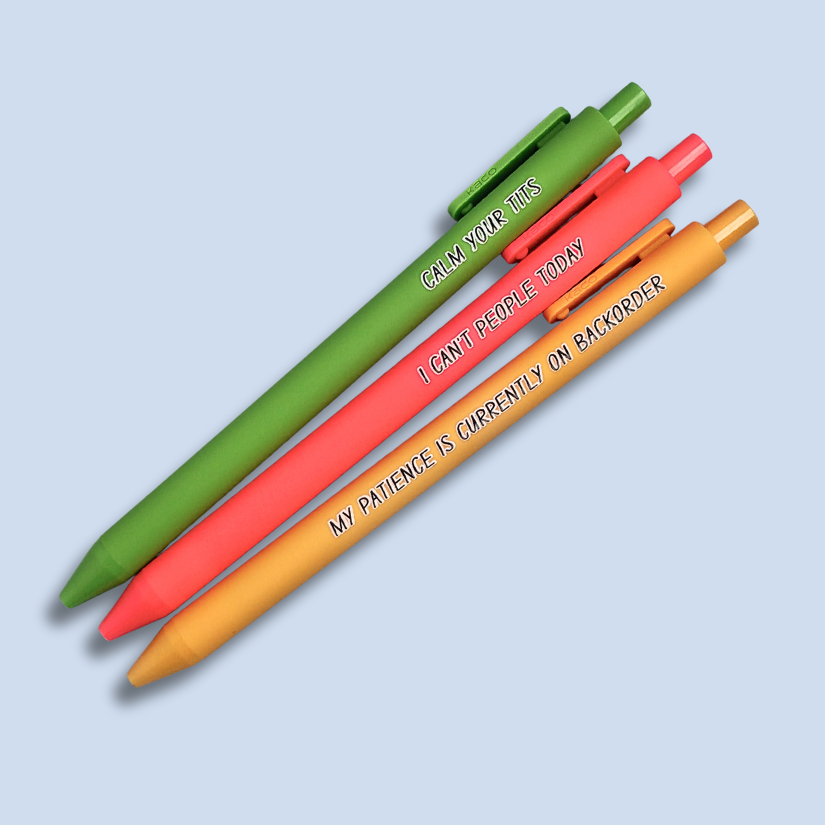 Three colorful pens with humorous text on a light blue background.  Pens read: CALM YOUR TITS (this pen is lime green), I CAN'T PEOPLE TODAY (this pen is coral color), and MY PATIENCE IS CURRENTLY ON BACKORDER (this pen is yellow)